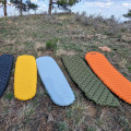 How do I choose a sleeping mat for camping?